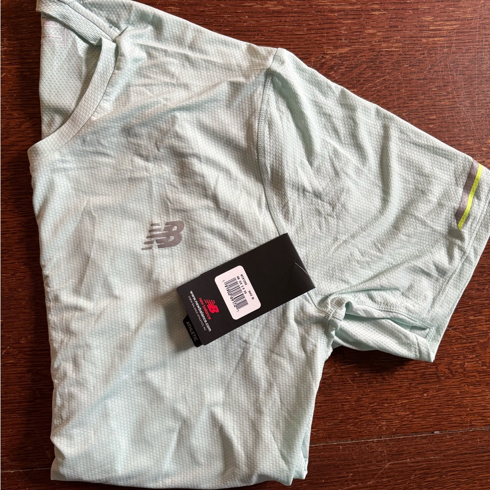 New Balance Ice Tee. new with tags. Color is mint green.